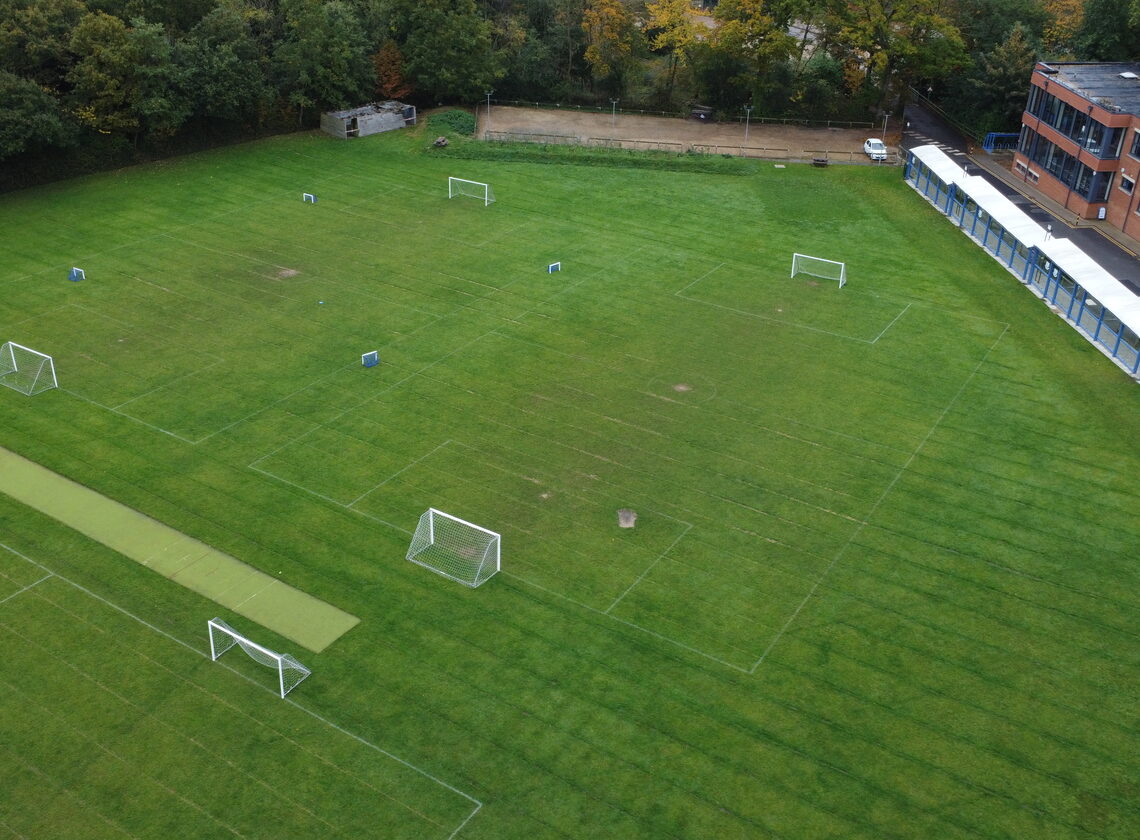 Extensive playing fields with football pitches