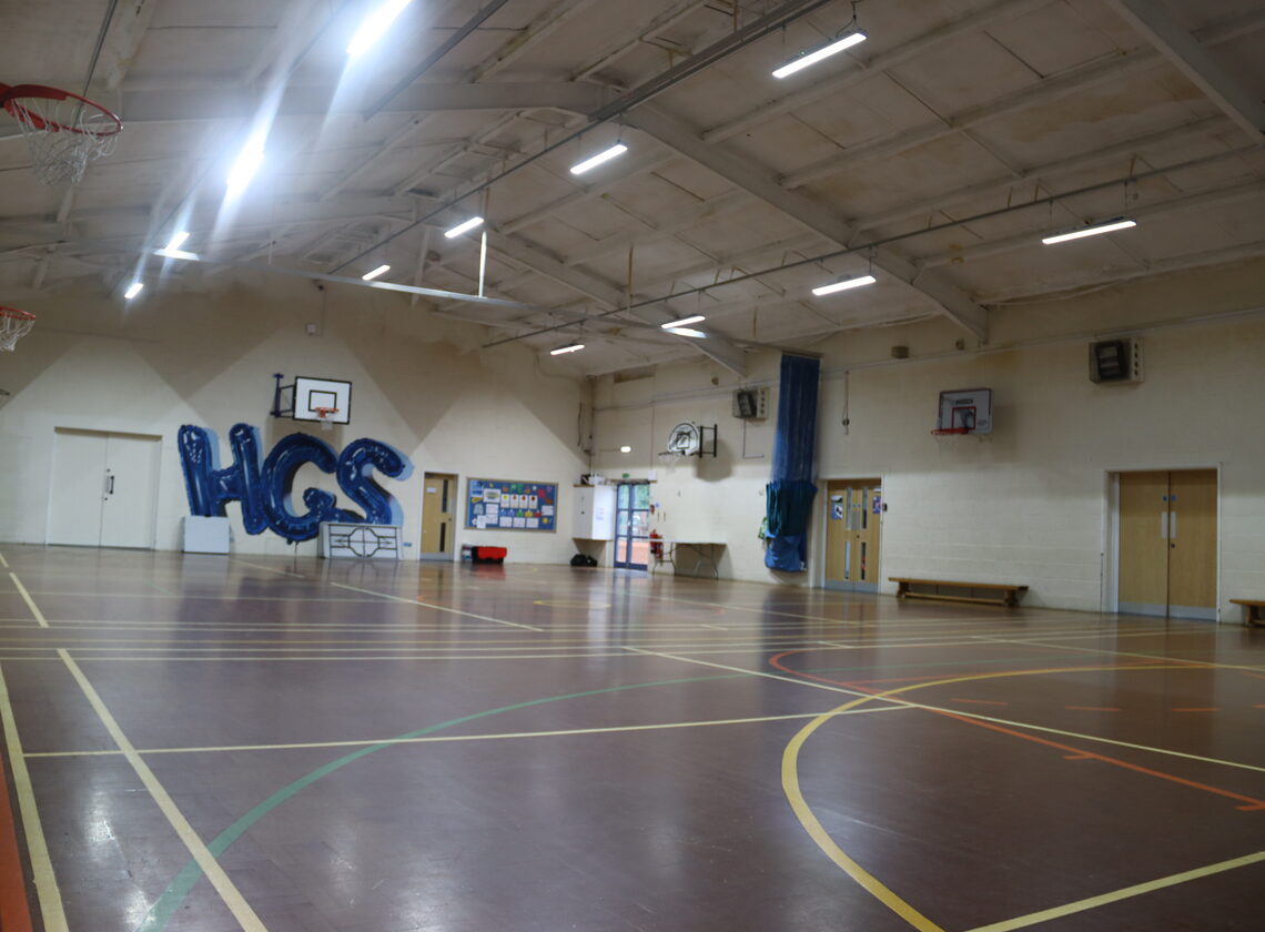 Indoor sports hall with basketball and marked courts
